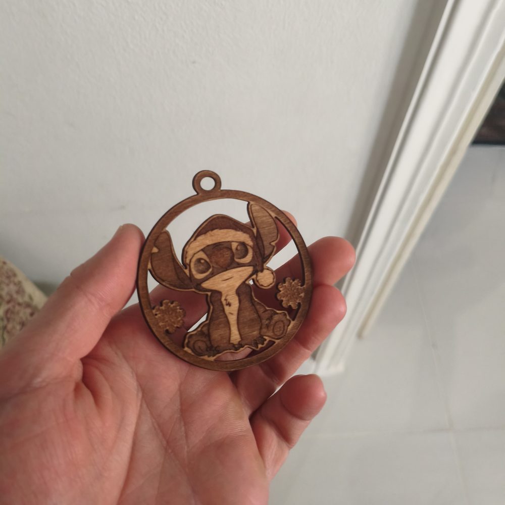 Stitch Christmas ornament, laser-cut from wood with the design engraved and cut through