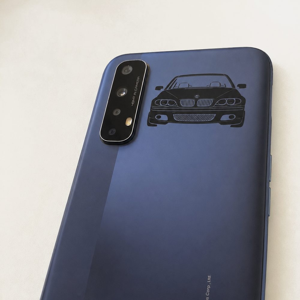 BMW front-end outline engraved on the back of a blue phone